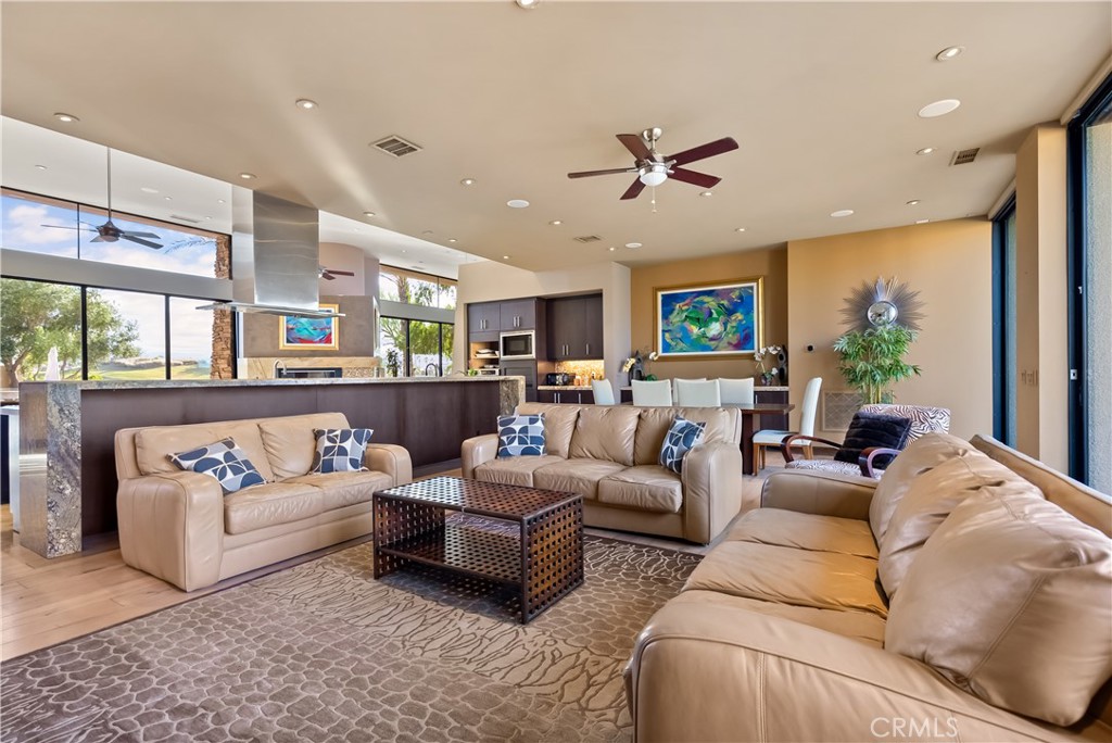 68 Royal St Georges Way Rancho Mirage, CA 92270 - Photo 35 of 75 a living room with furniture kitchen view and a large window