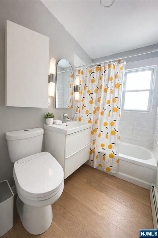 122 Dean Drive, Unit 1 Tenafly, NJ 07670 - Photo 9 of 15 a bathroom with a sink toilet and shower