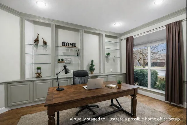 a view of a workspace with furniture