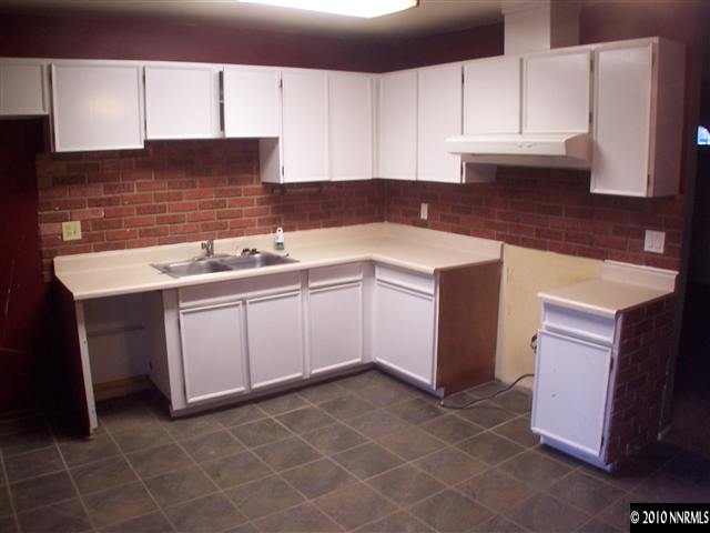 3395 Heights Drive Reno, NV 89503 - Photo 2 of 9 a kitchen with a sink cabinets and window