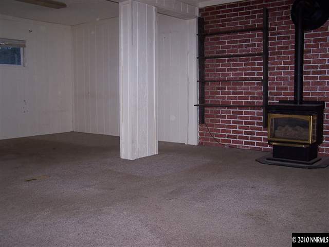 3395 Heights Drive Reno, NV 89503 - Photo 6 of 9 a view of an empty room with a fireplace