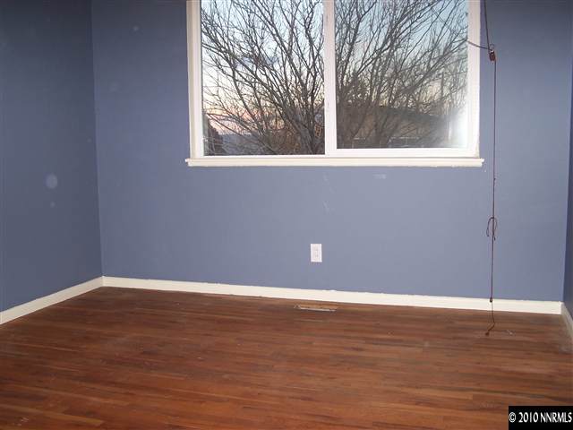 3395 Heights Drive Reno, NV 89503 - Photo 7 of 9 a view of a small space with wooden floor and a window