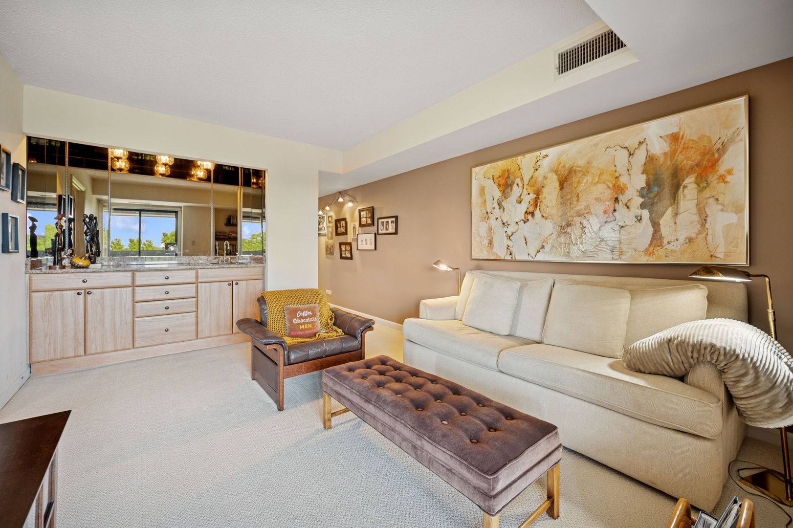 1671 Mission Hills Road, Unit 501 Northbrook, IL 60062 - Photo 15 of 27 a living room with furniture and a flat screen tv