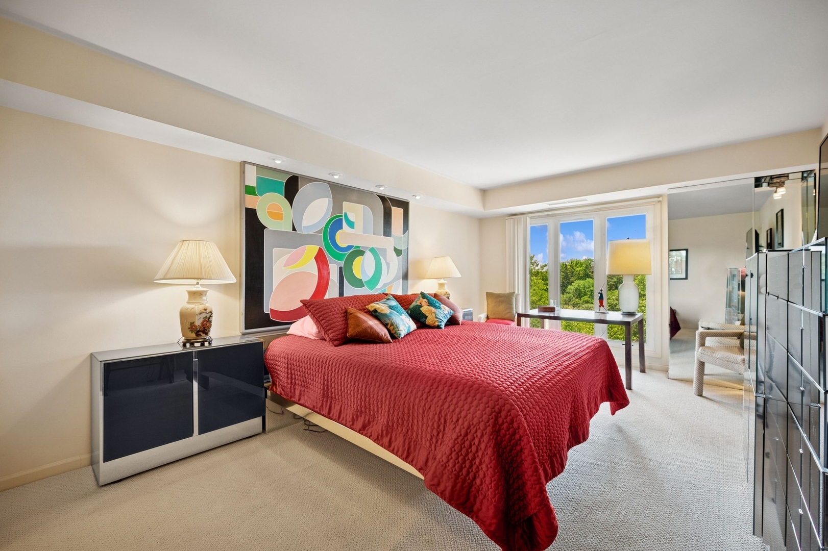 1671 Mission Hills Road, Unit 501 Northbrook, IL 60062 - Photo 17 of 27 a bedroom with a bed table and window