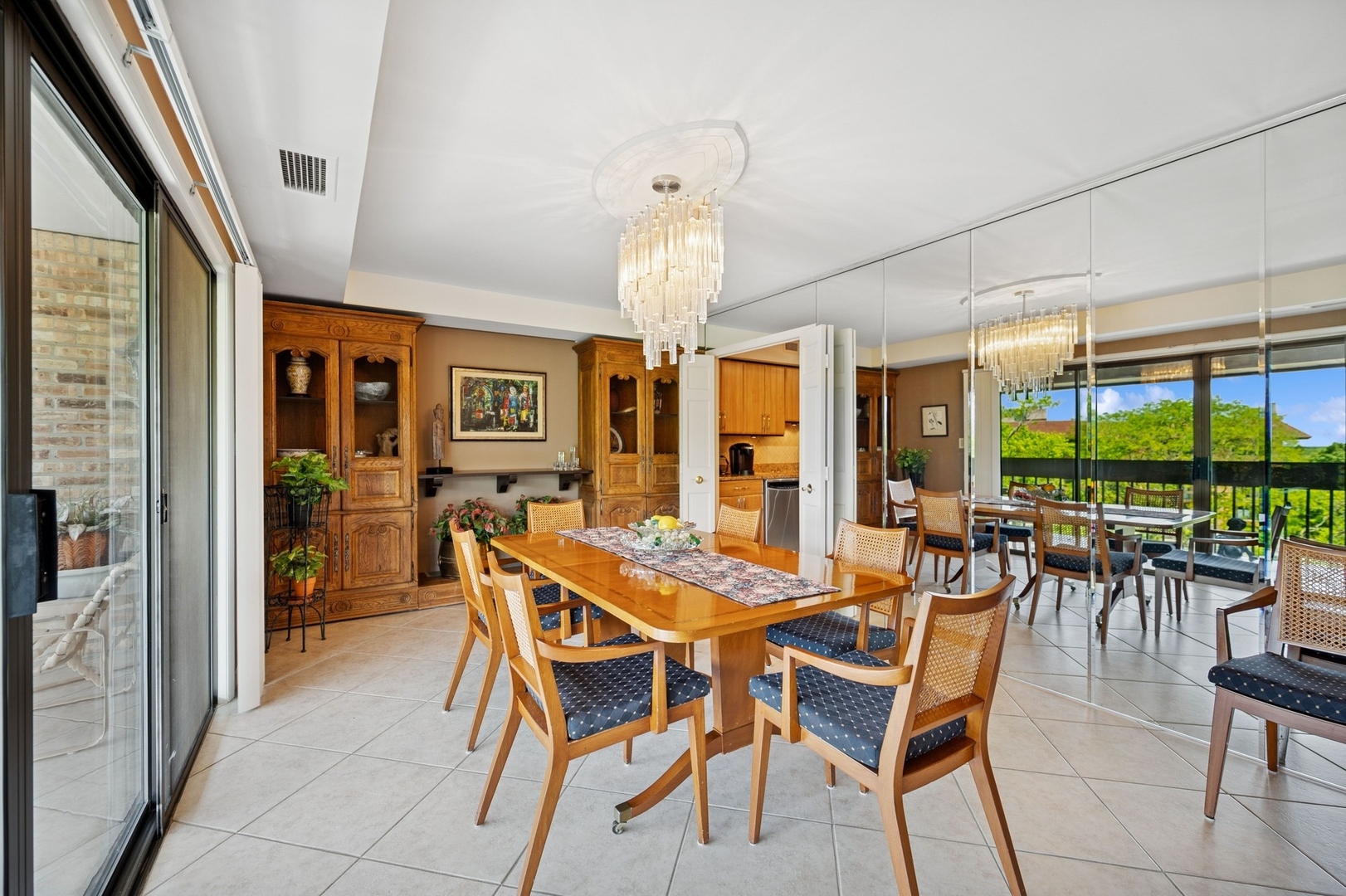 1671 Mission Hills Road, Unit 501 Northbrook, IL 60062 - Photo 9 of 27 a view of a dining room with furniture window and outside view