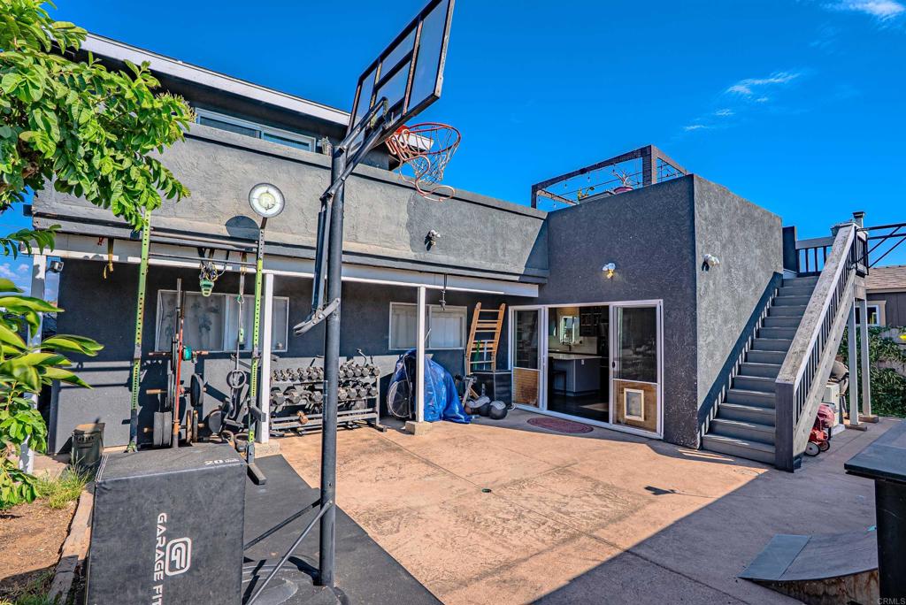 1016 Delaware Street Imperial Beach, CA 91932 - Photo 1 of 27 Walk up these back stairs to the awesome deck!