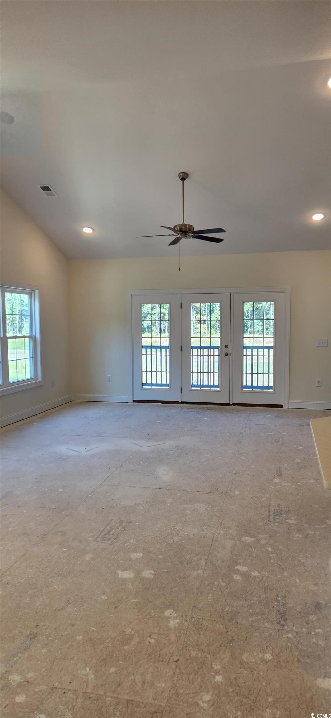 1147 Freeboard Street, Unit 201 Murrells Inlet, SC 29576 - Photo 32 of 38 Spare room featuring a healthy amount of sunlight and ceiling fan