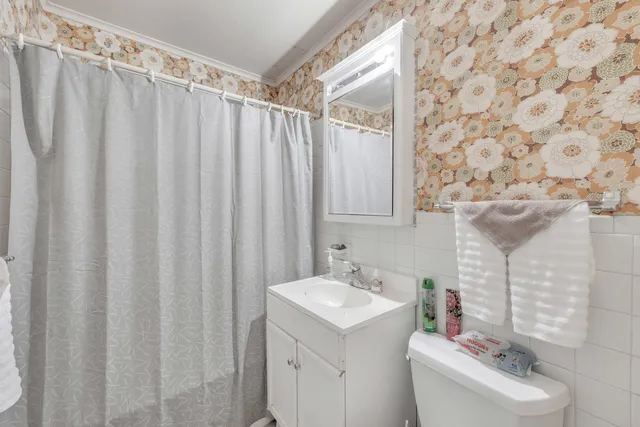 a bathroom with a sink and a toilet