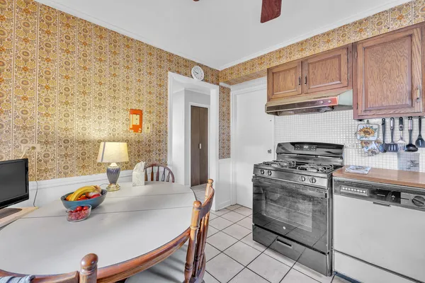 a kitchen with a stove and a sink