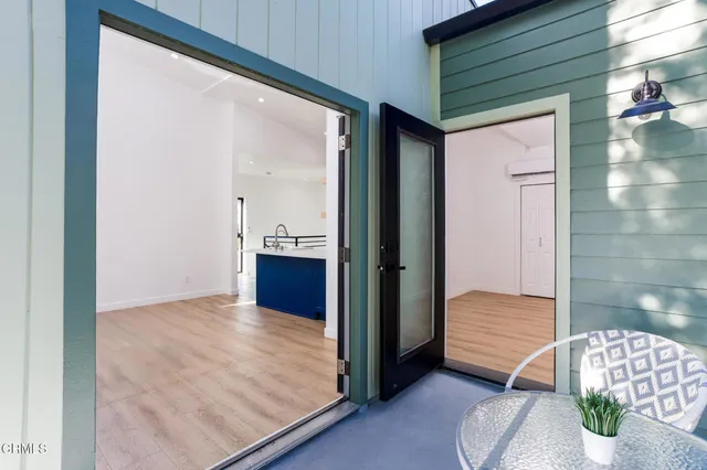 a view of livingroom with furniture and wooden floor