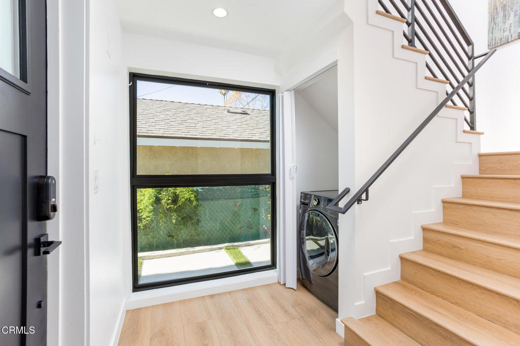 4947 Stratford Road Los Angeles, CA 90042 - Photo 17 of 30 a view of an entryway with wooden floor and windows