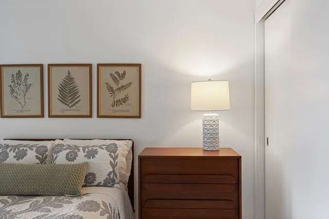a view of bathroom with a sink and a washer dryer
