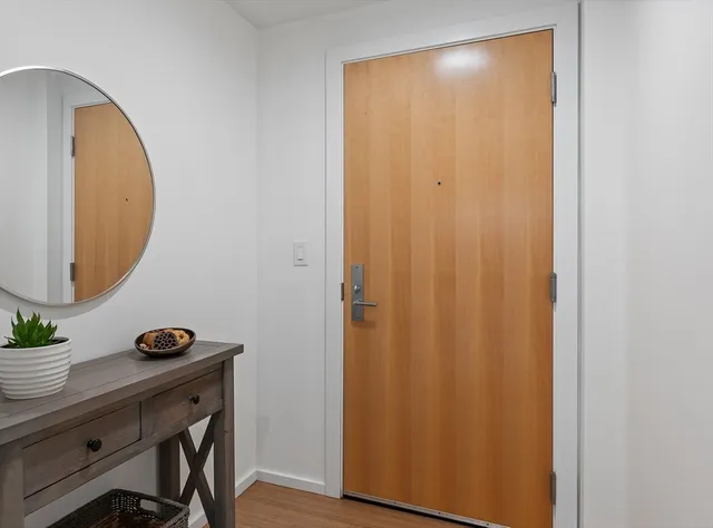 a view of a building and a people on a street