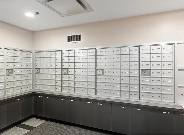 a view of a chairs and table in the patio