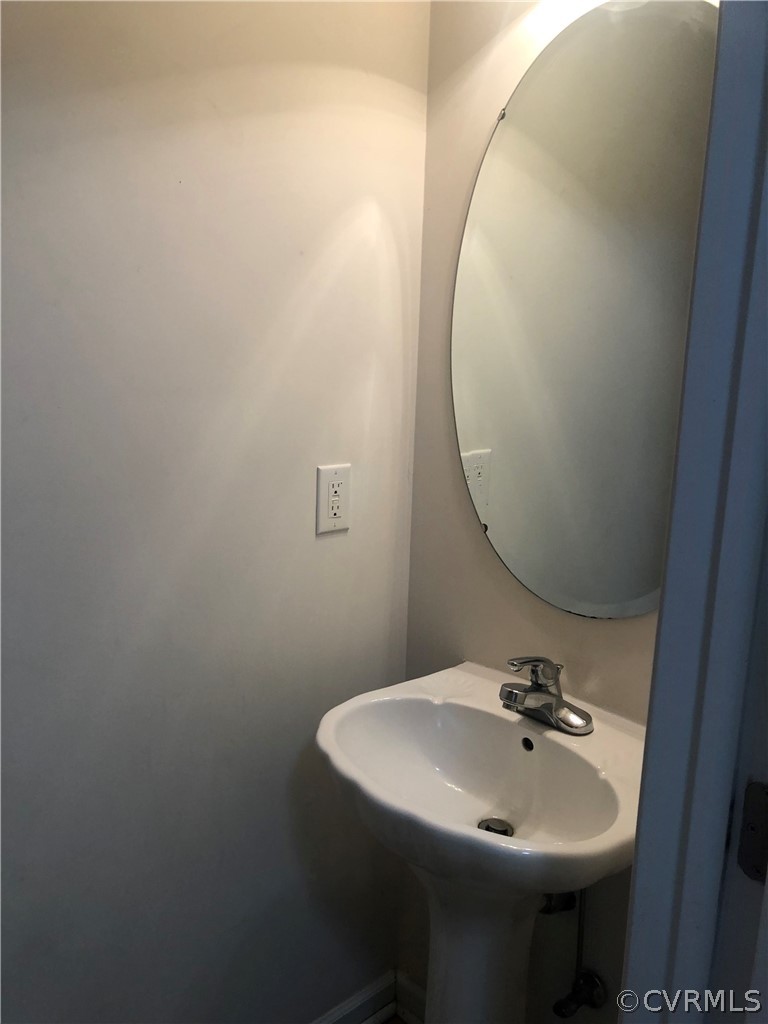4797 Takach Road Prince George, VA 23875 - Photo 15 of 24 a bathroom with a sink and a mirror