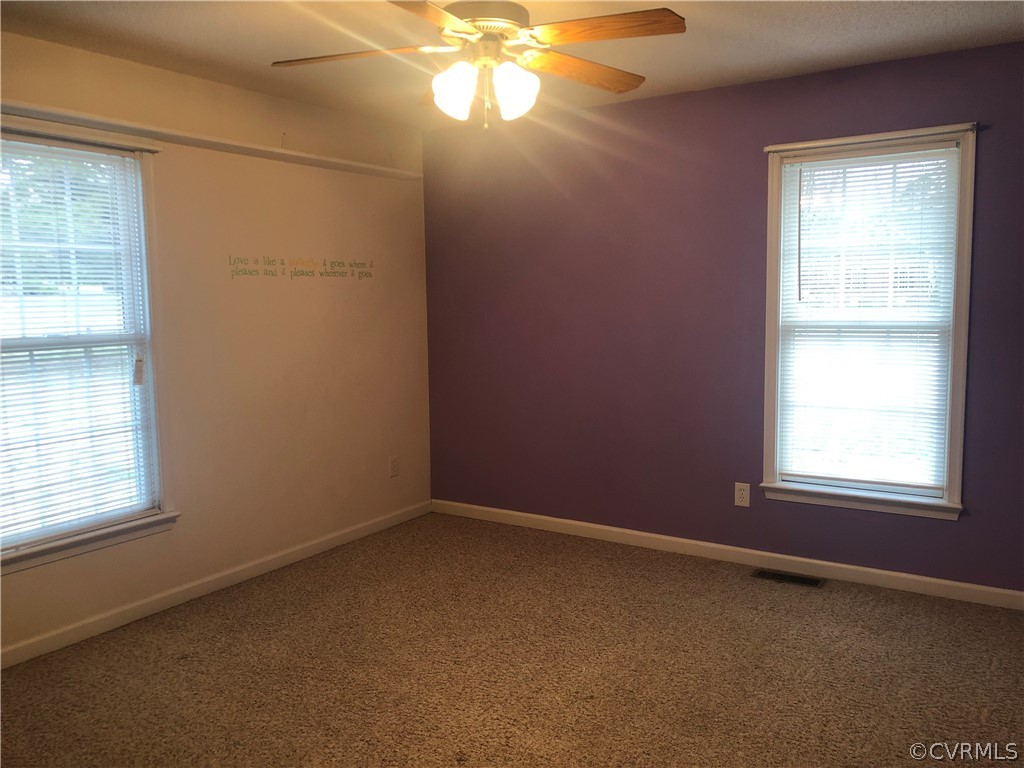 4797 Takach Road Prince George, VA 23875 - Photo 21 of 24 an empty room with a window
