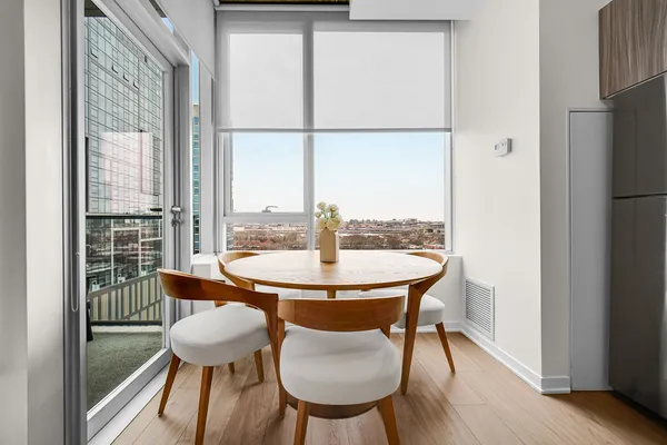 a kitchen with granite countertop a stove and a refrigerator