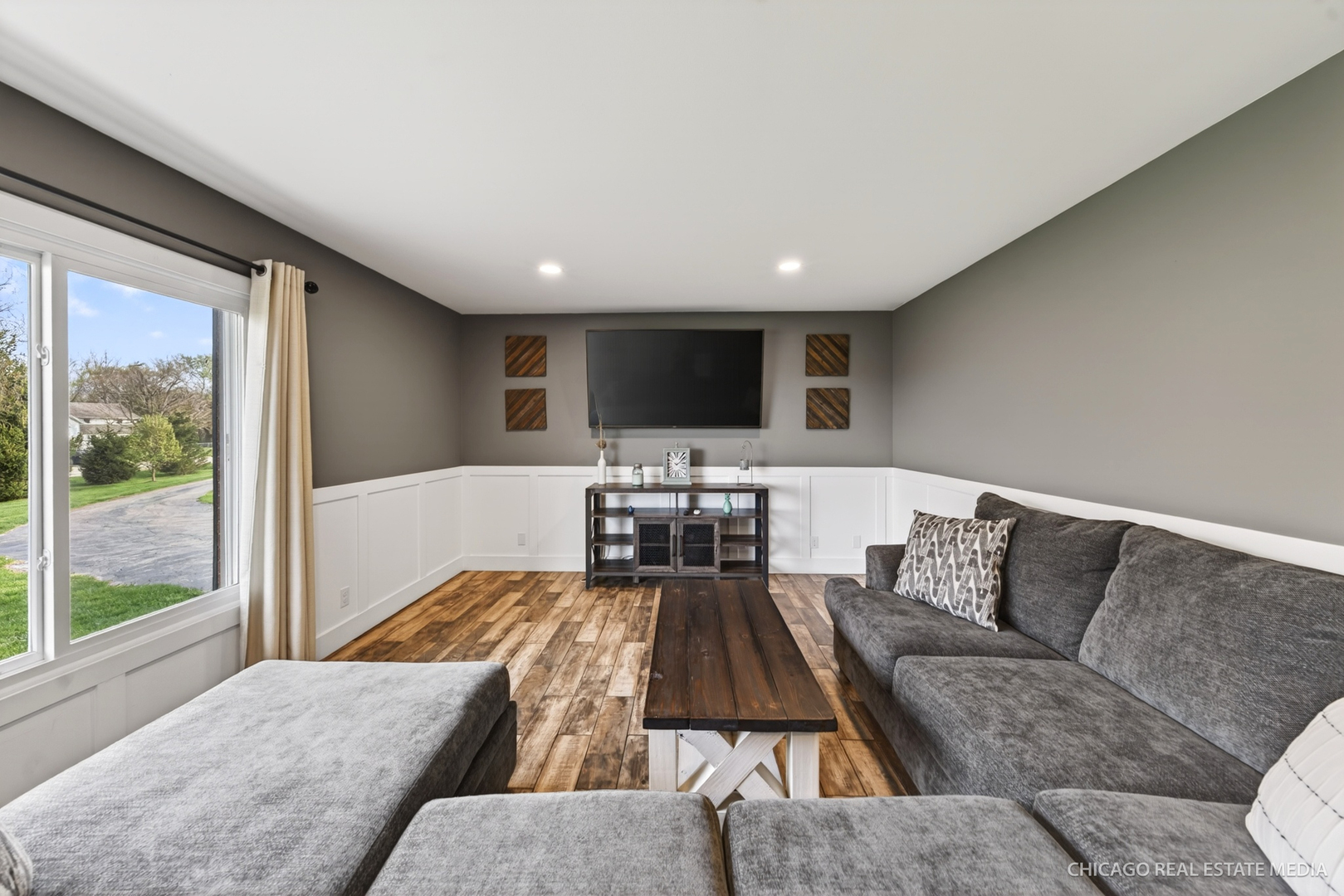 1513 Deerpass Road Marengo, IL 60152 - Photo 15 of 48 a living room with furniture and a flat screen tv