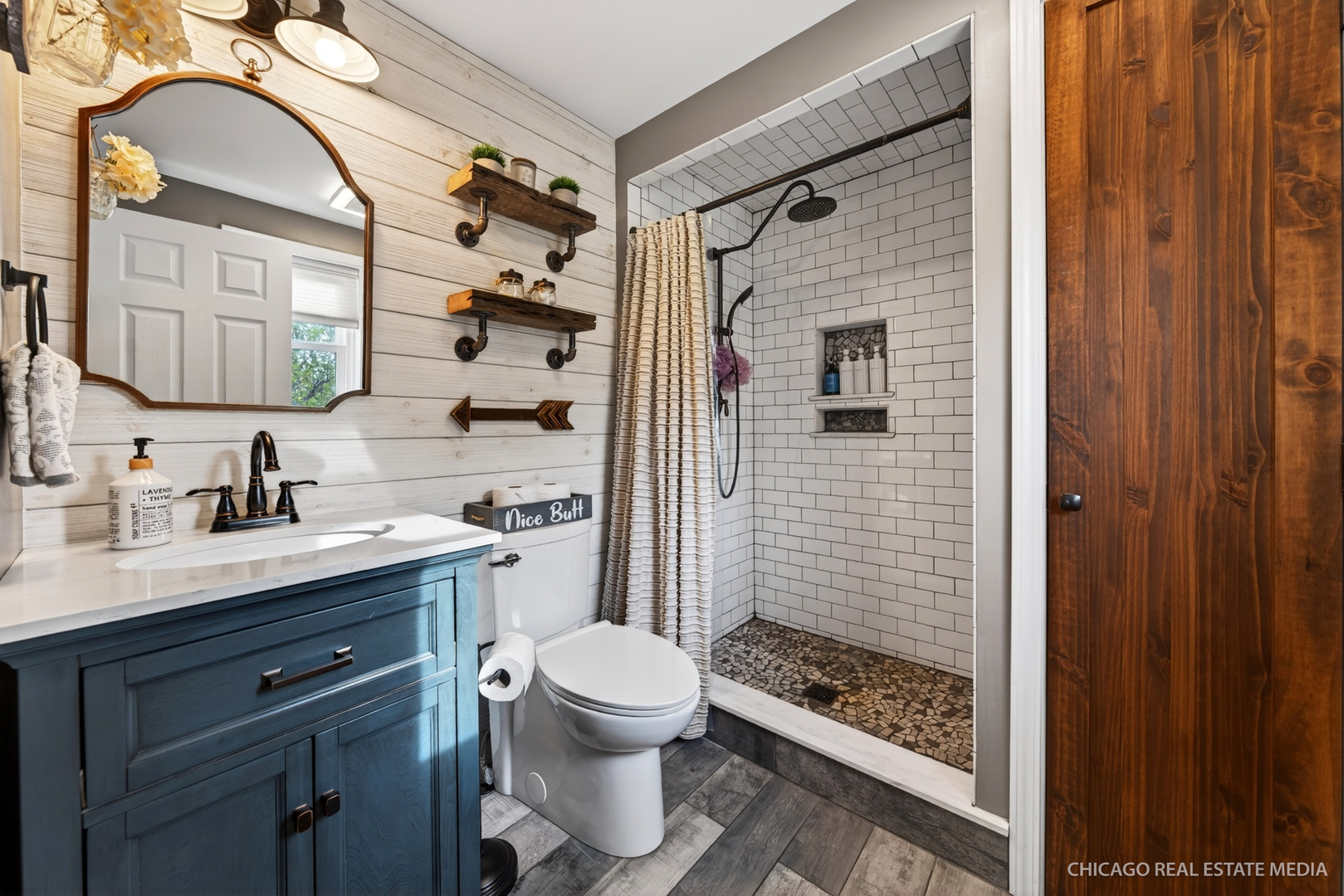 1513 Deerpass Road Marengo, IL 60152 - Photo 18 of 48 a bathroom with a sink a toilet and shower