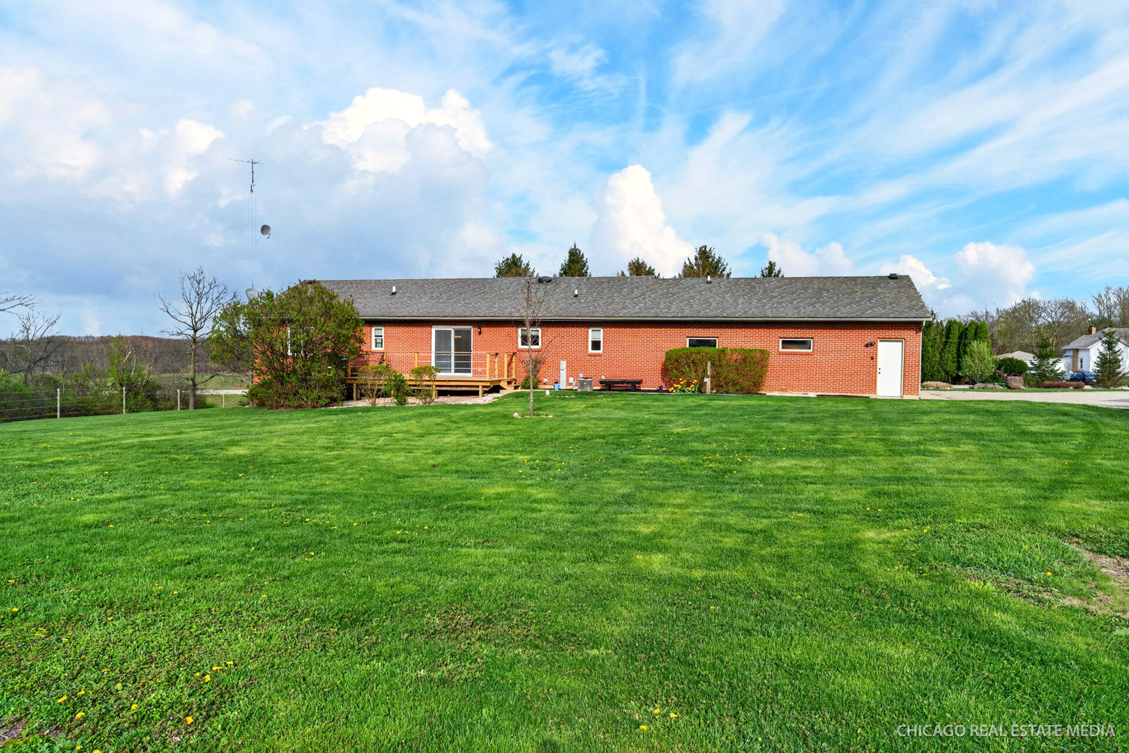 1513 Deerpass Road Marengo, IL 60152 - Photo 29 of 48 a view of a house with a big yard
