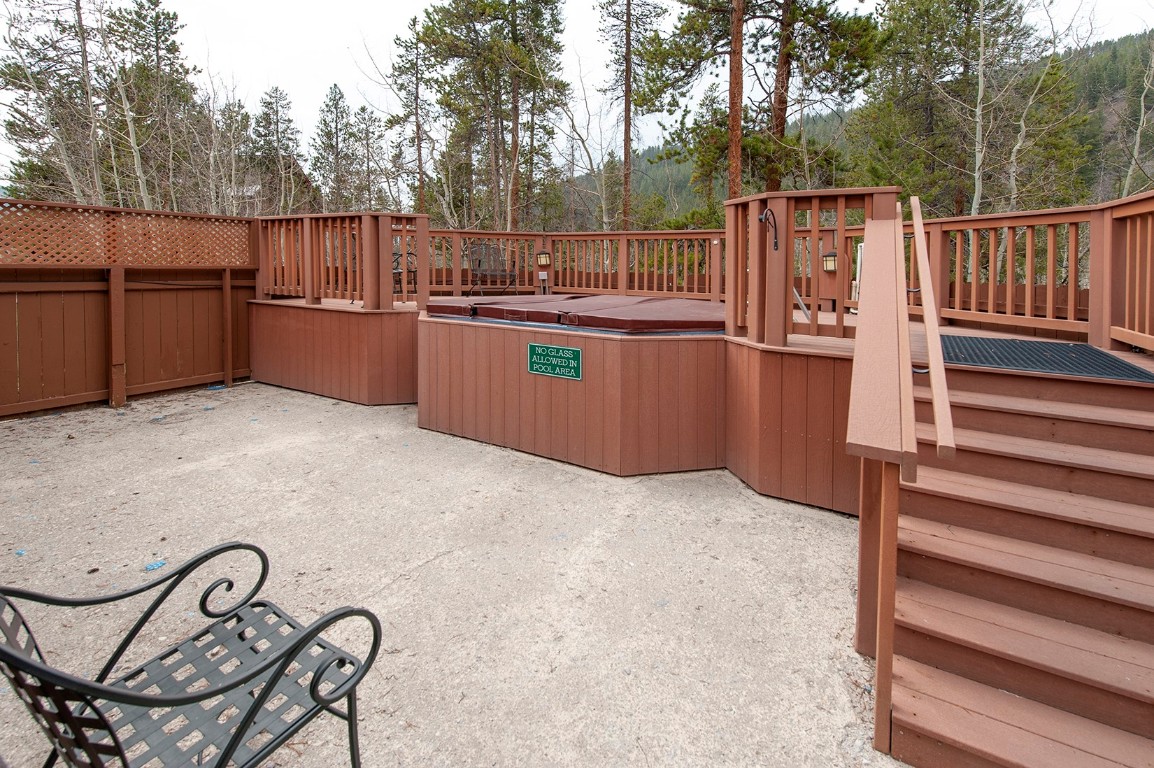 28 Trappers Crossing Trail, Unit 8760 Keystone, CO 80435 - Photo 35 of 37 a view of a backyard with sitting area