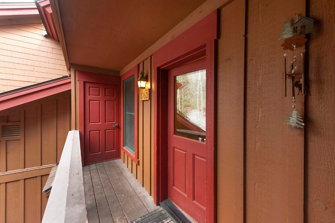 28 Trappers Crossing Trail, Unit 8760 Keystone, CO 80435 - Photo 36 of 37 a view of hallway with wooden floor