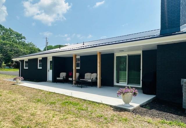 7 Indian Lane Vanderbilt, PA 15486 - Photo 11 of 38 a view of a house with patio in front of house