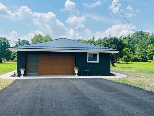 7 Indian Lane Vanderbilt, PA 15486 - Photo 14 of 38 a front view of a house with yard