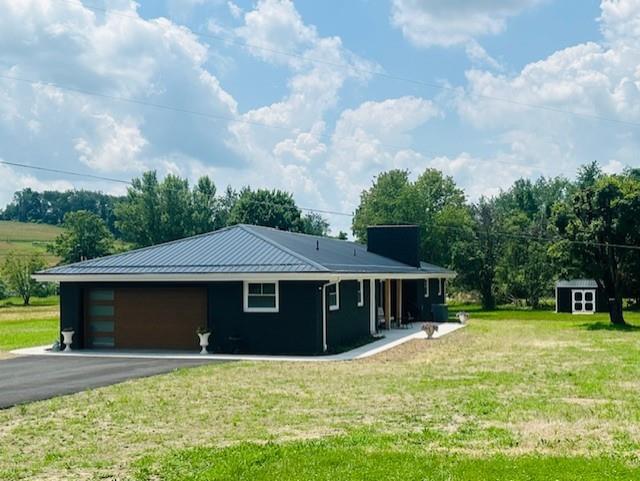 7 Indian Lane Vanderbilt, PA 15486 - Photo 16 of 38 a front view of a house with a yard