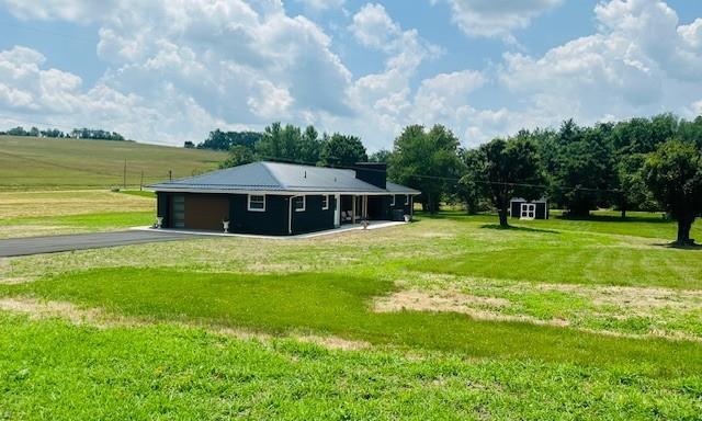 7 Indian Lane Vanderbilt, PA 15486 - Photo 18 of 38 a front view of a house with garden