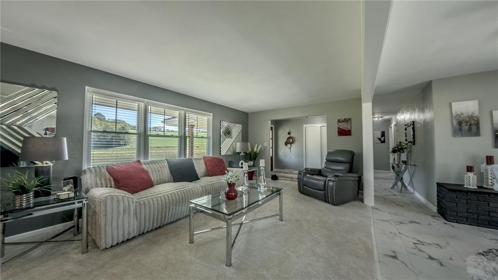 7 Indian Lane Vanderbilt, PA 15486 - Photo 21 of 38 a living room with furniture and a large window