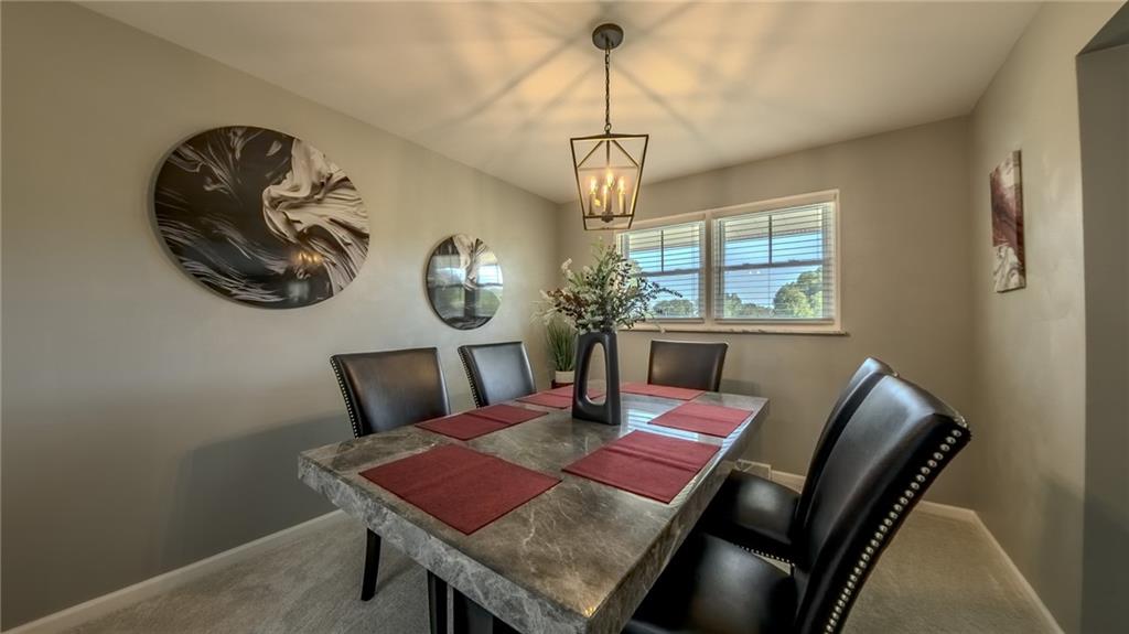 7 Indian Lane Vanderbilt, PA 15486 - Photo 28 of 38 a view of a dining room with furniture window and outside view