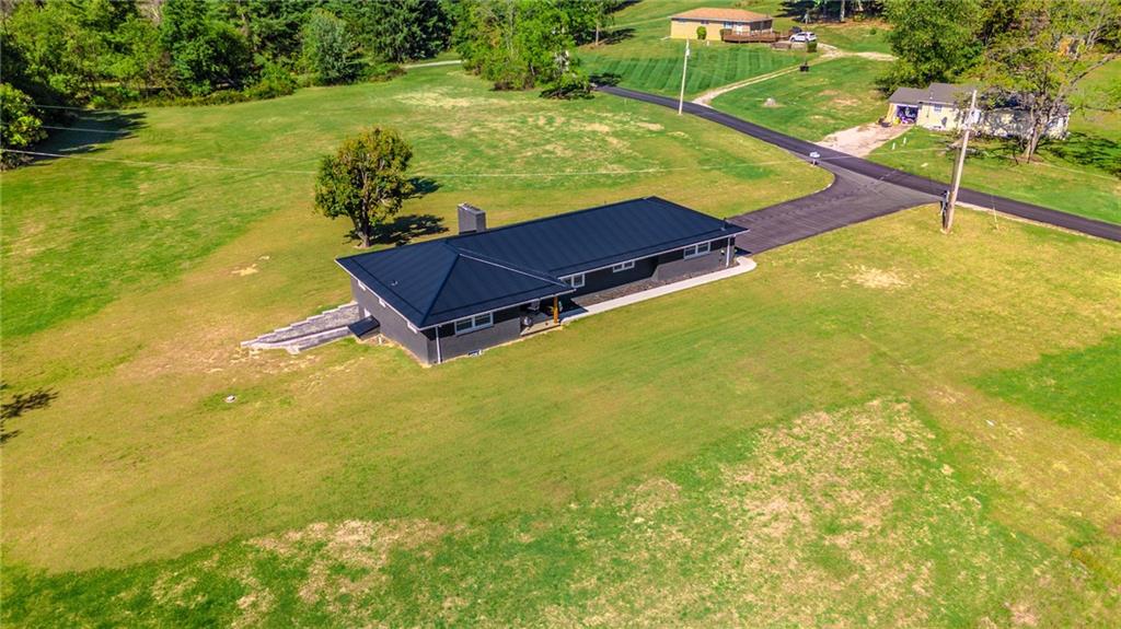 7 Indian Lane Vanderbilt, PA 15486 - Photo 3 of 38 a view of an outdoor space and swimming pool