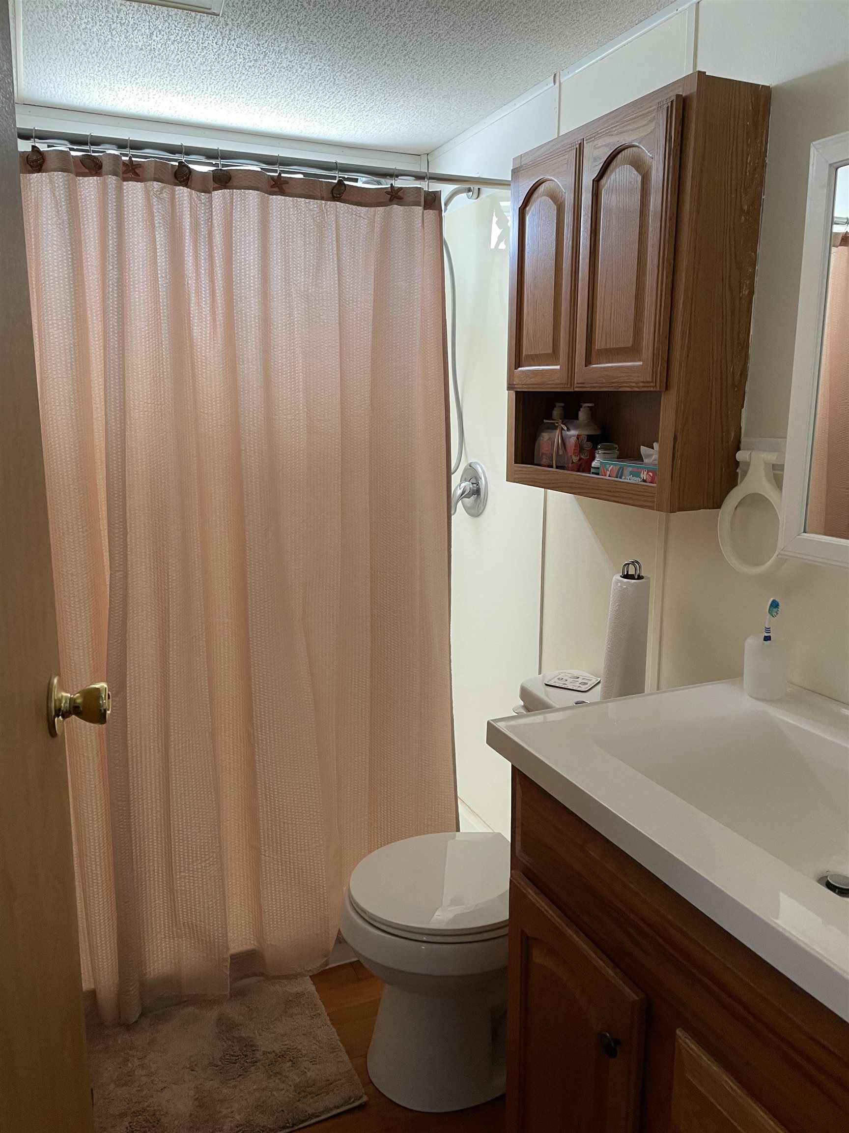 430 Highway 9 Marmora, NJ 08223 - Photo 13 of 17 a bathroom with a sink a toilet and shower