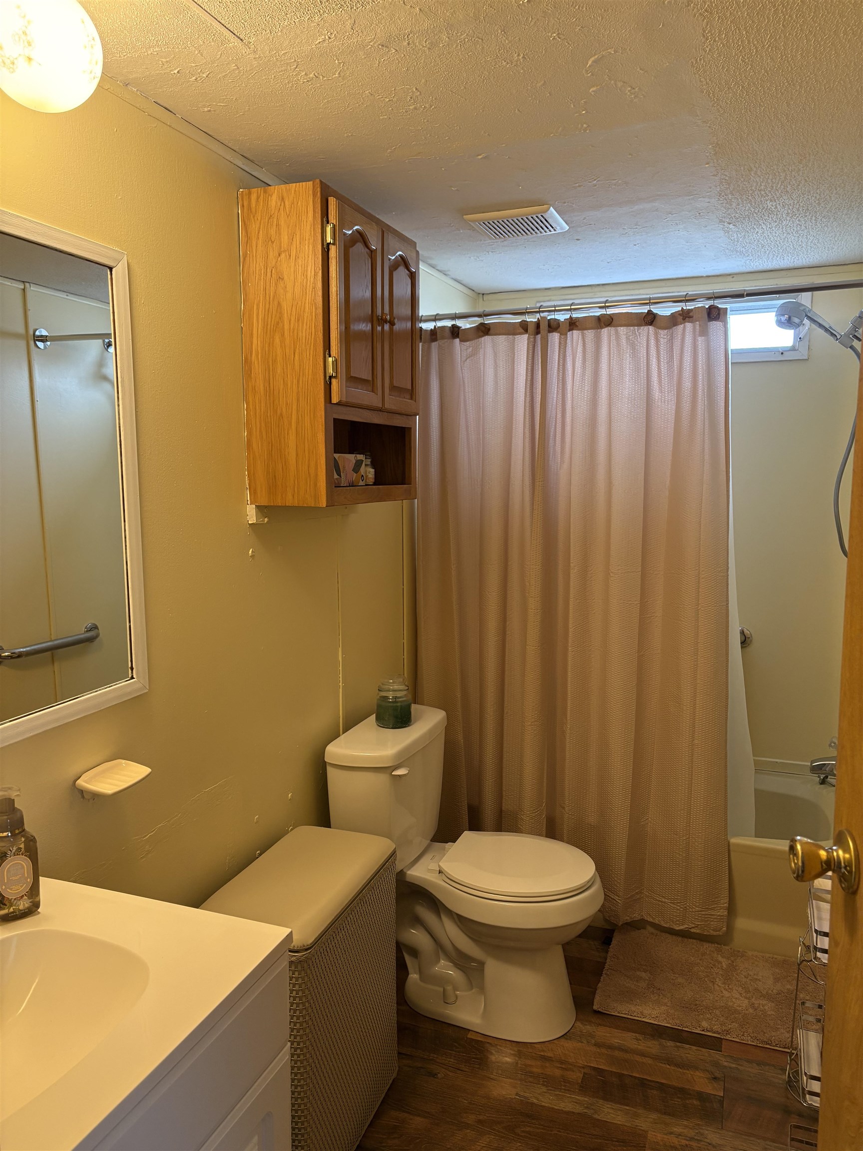 430 Highway 9 Marmora, NJ 08223 - Photo 14 of 17 a bathroom with a toilet a sink and mirror