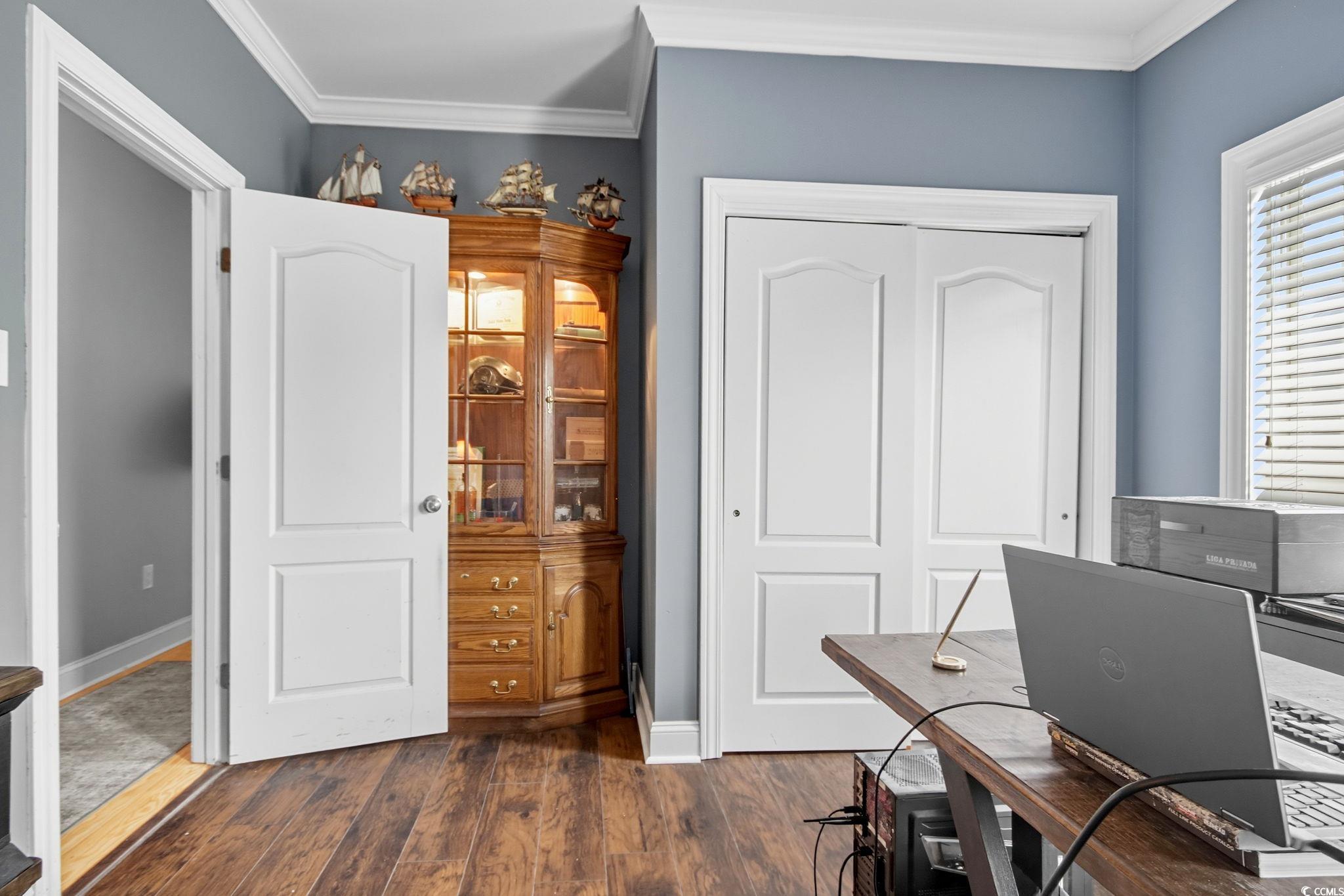 21 Craftsman Lane Georgetown, SC 29440 - Photo 21 of 39 Office space with ornamental molding and dark wood-style floors