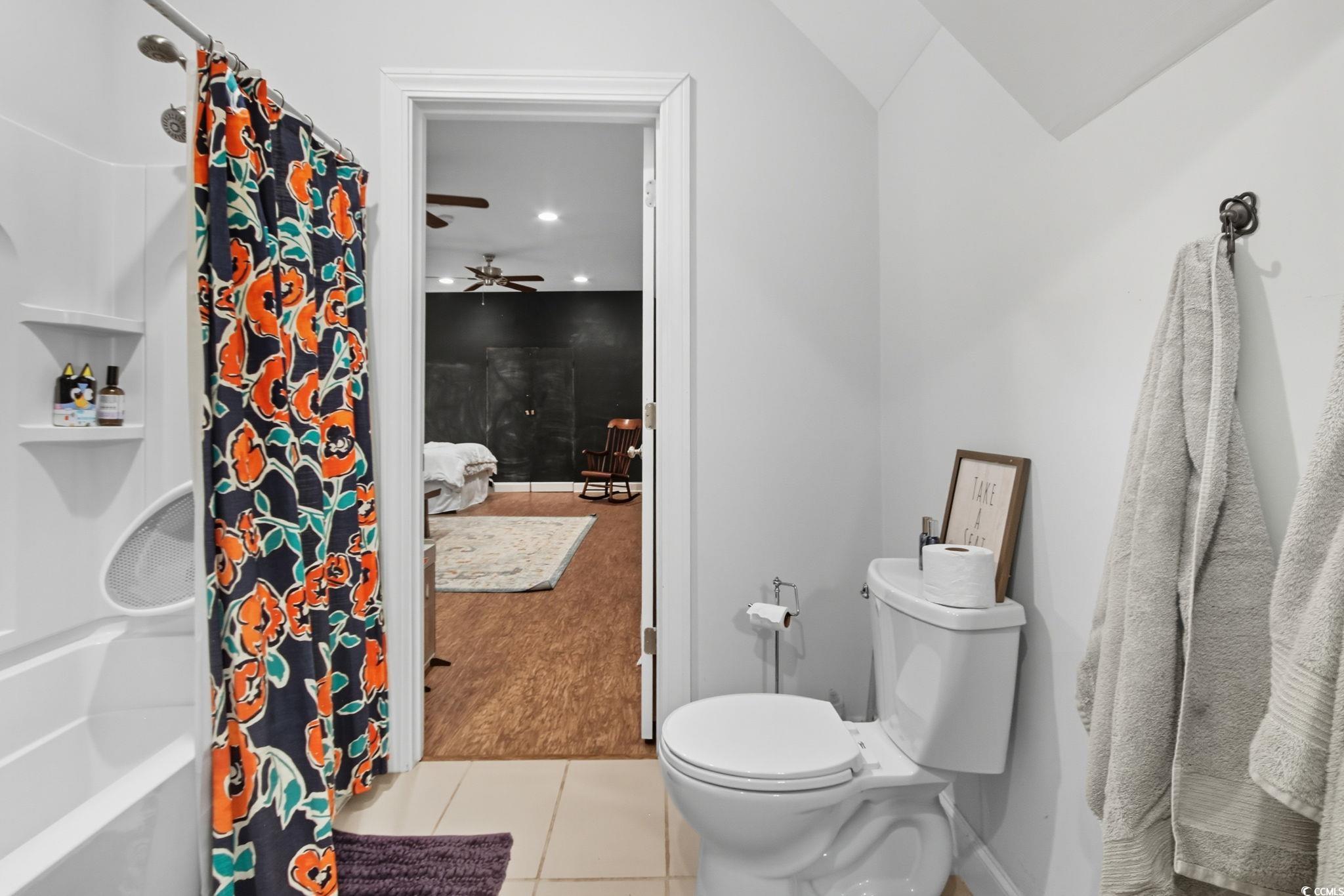 21 Craftsman Lane Georgetown, SC 29440 - Photo 30 of 39 Ensuite bathroom featuring light tile patterned floors, a ceiling fan, shower / bathtub combination with curtain, and recessed lighting