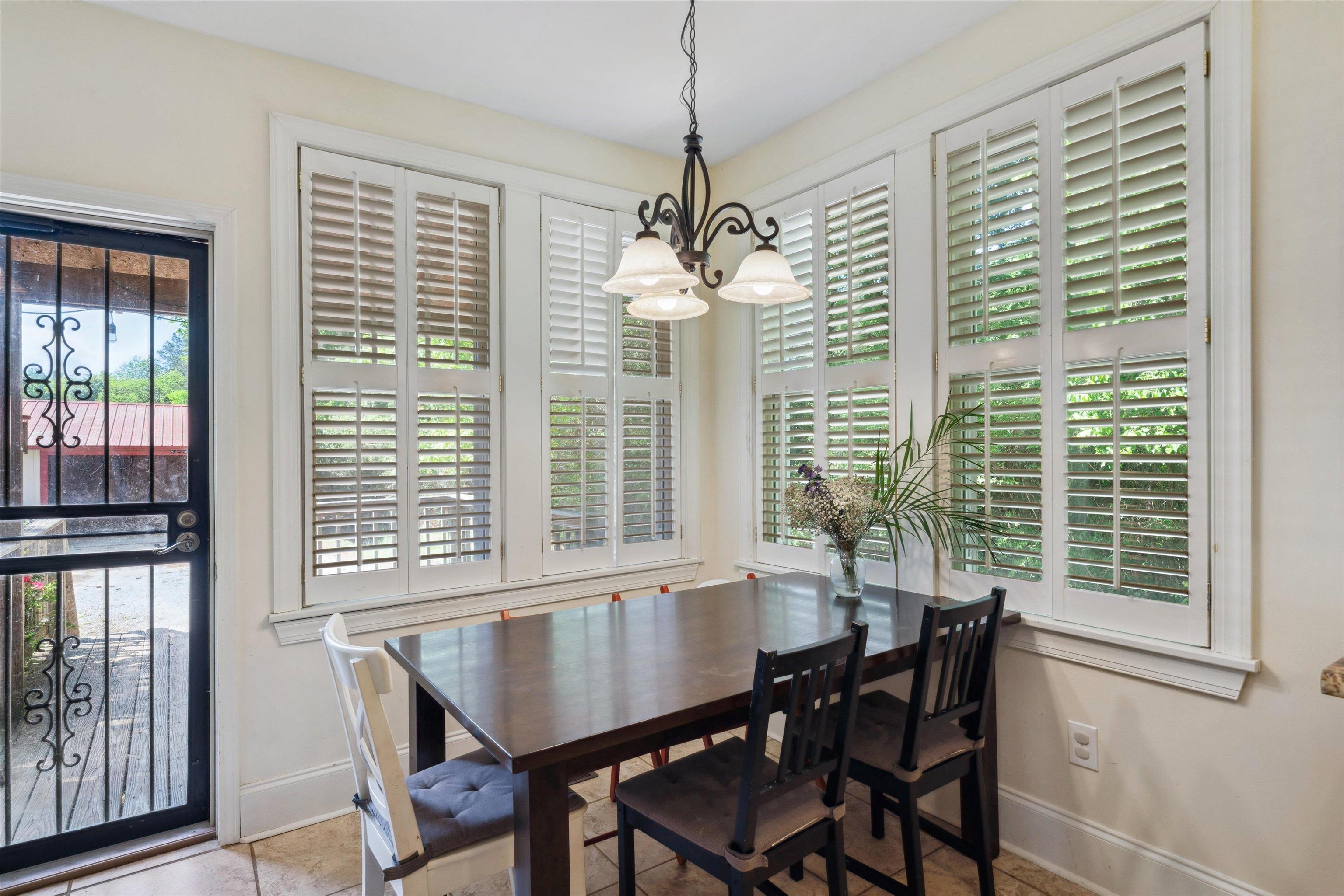 30 Blue Gray Road Piperton, TN 38017 - Photo 11 of 31 a view of a dining room with furniture and windows