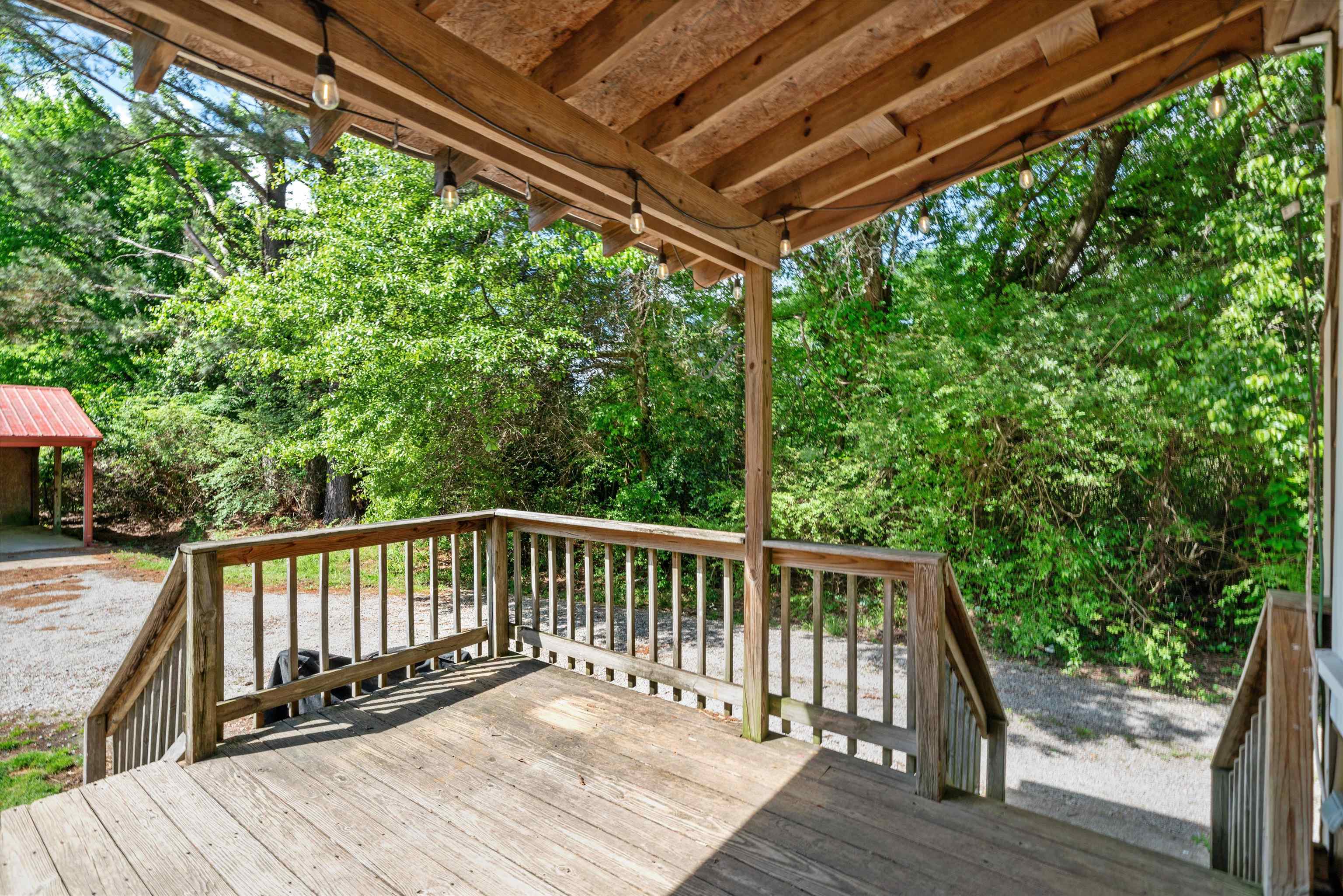 30 Blue Gray Road Piperton, TN 38017 - Photo 23 of 31 a view of balcony with wooden floor and fence