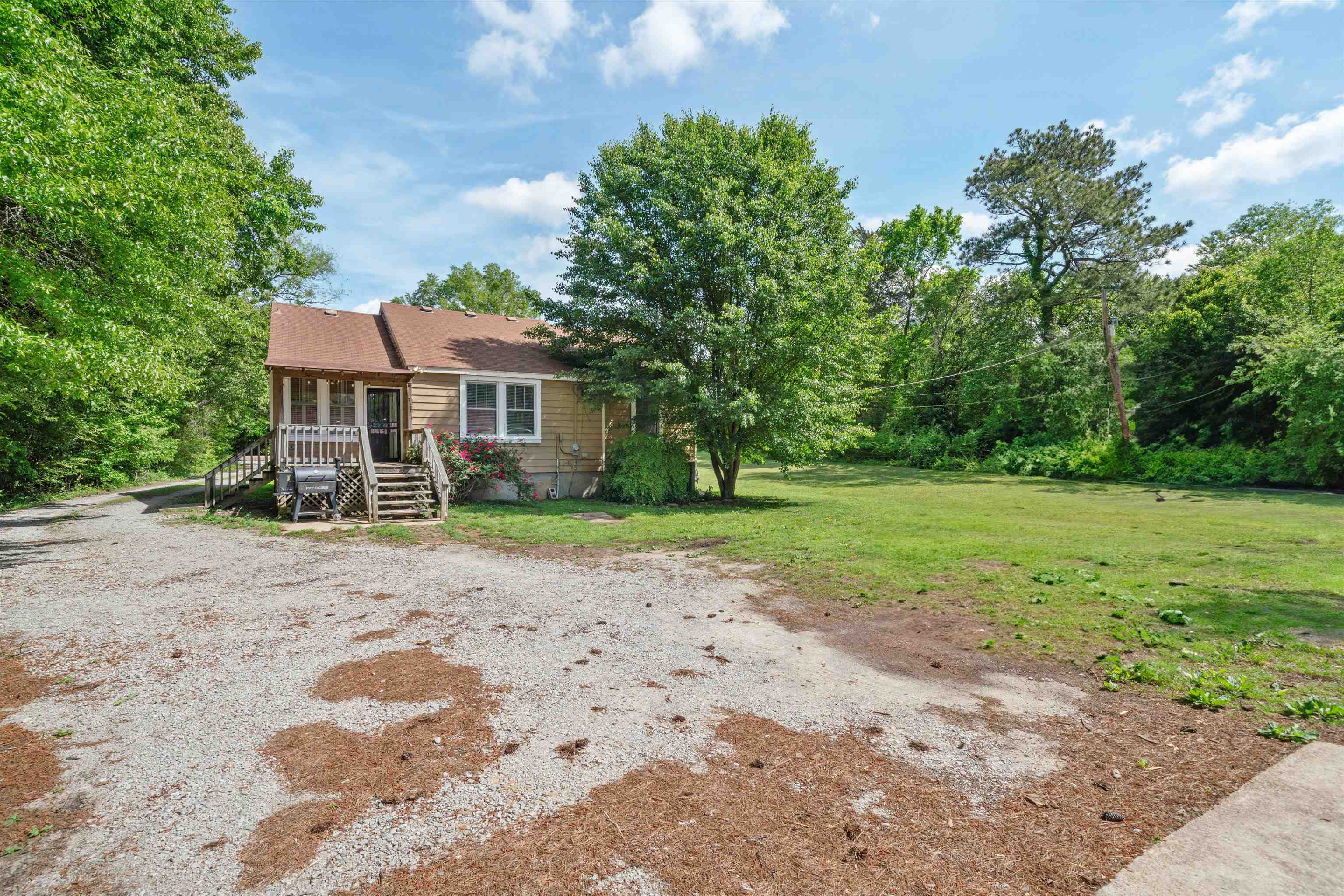 30 Blue Gray Road Piperton, TN 38017 - Photo 25 of 31 a front view of a house with garden