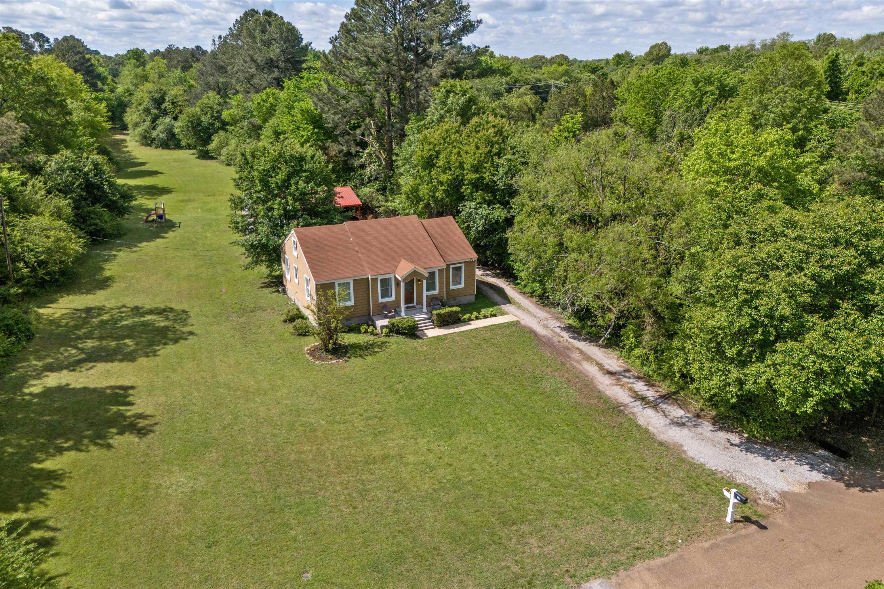 30 Blue Gray Road Piperton, TN 38017 - Photo 3 of 31 a view of a lake with a yard