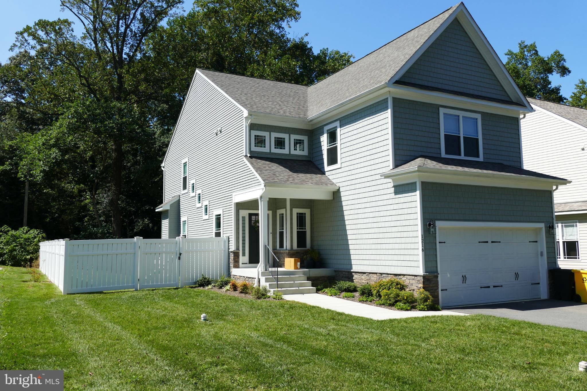 1217 Hampton Road Annapolis, MD 21409 - Photo 2 of 25 a view of a house with a yard and plants