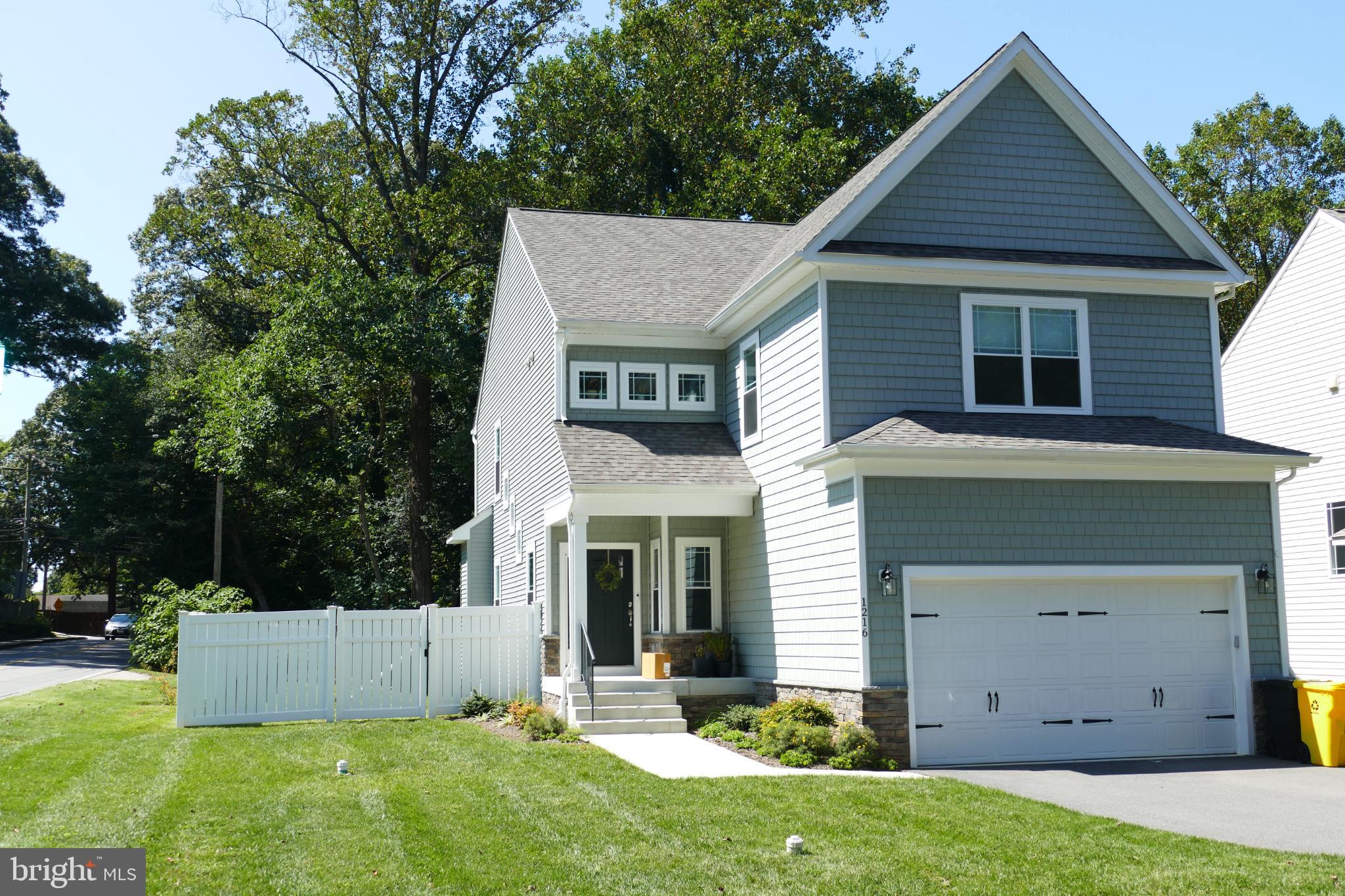 1217 Hampton Road Annapolis, MD 21409 - Photo 2 of 4 a view of a house with a yard