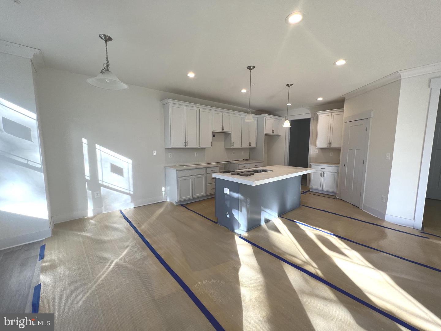 1217 Hampton Road Annapolis, MD 21409 - Photo 6 of 25 a kitchen with stainless steel appliances granite countertop a sink a stove a refrigerator and cabinets