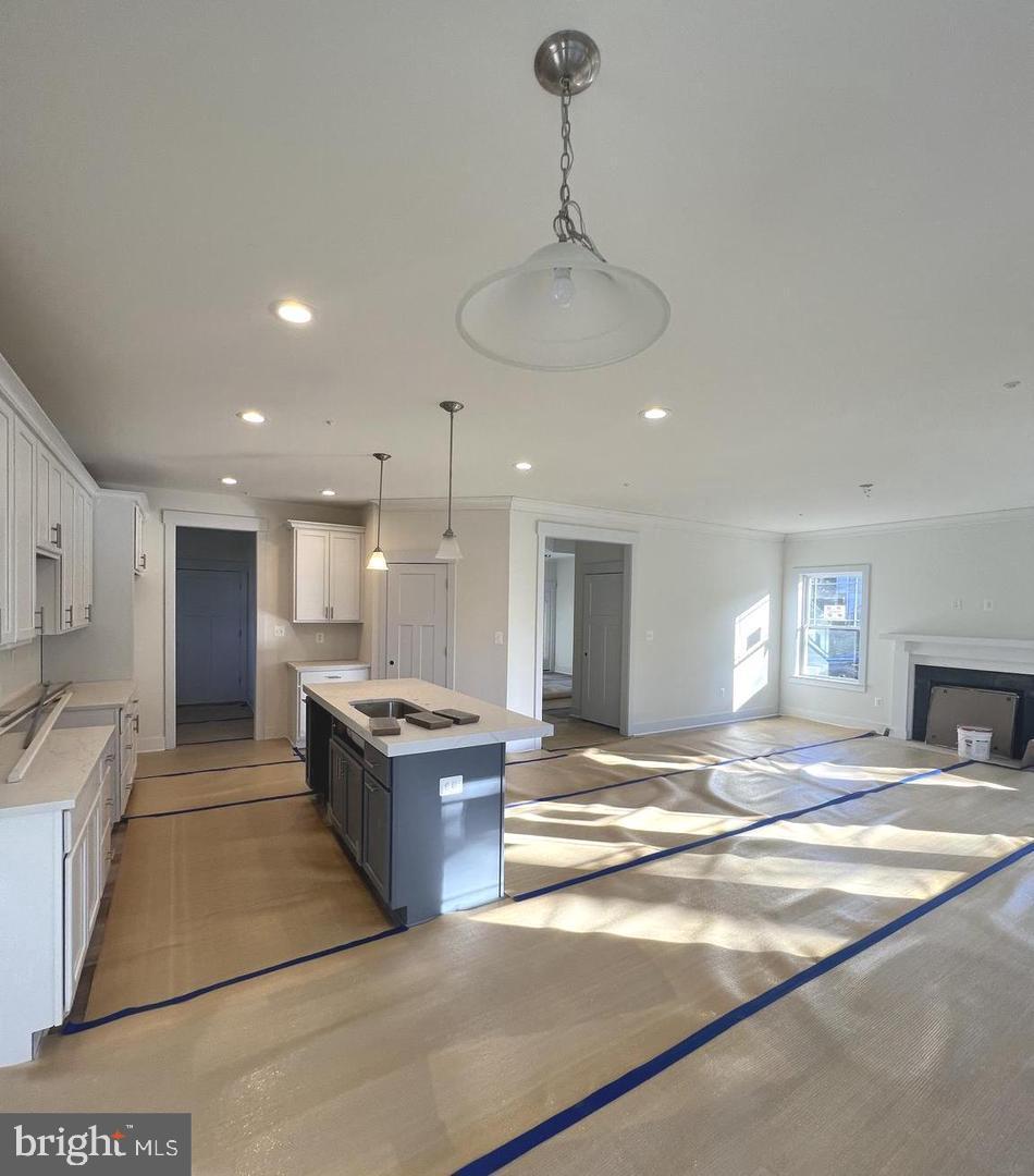 1217 Hampton Road Annapolis, MD 21409 - Photo 6 of 16 a kitchen with stainless steel appliances granite countertop a sink and refrigerator