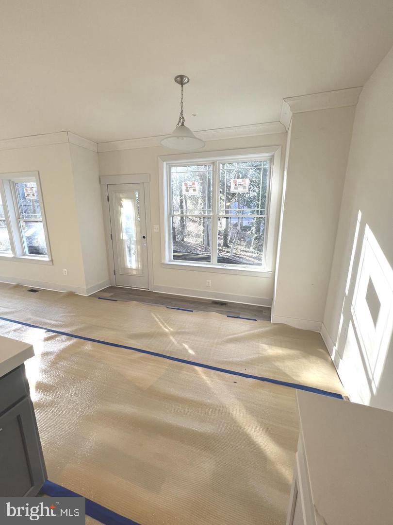 1217 Hampton Road Annapolis, MD 21409 - Photo 8 of 25 a view of an empty room with a window