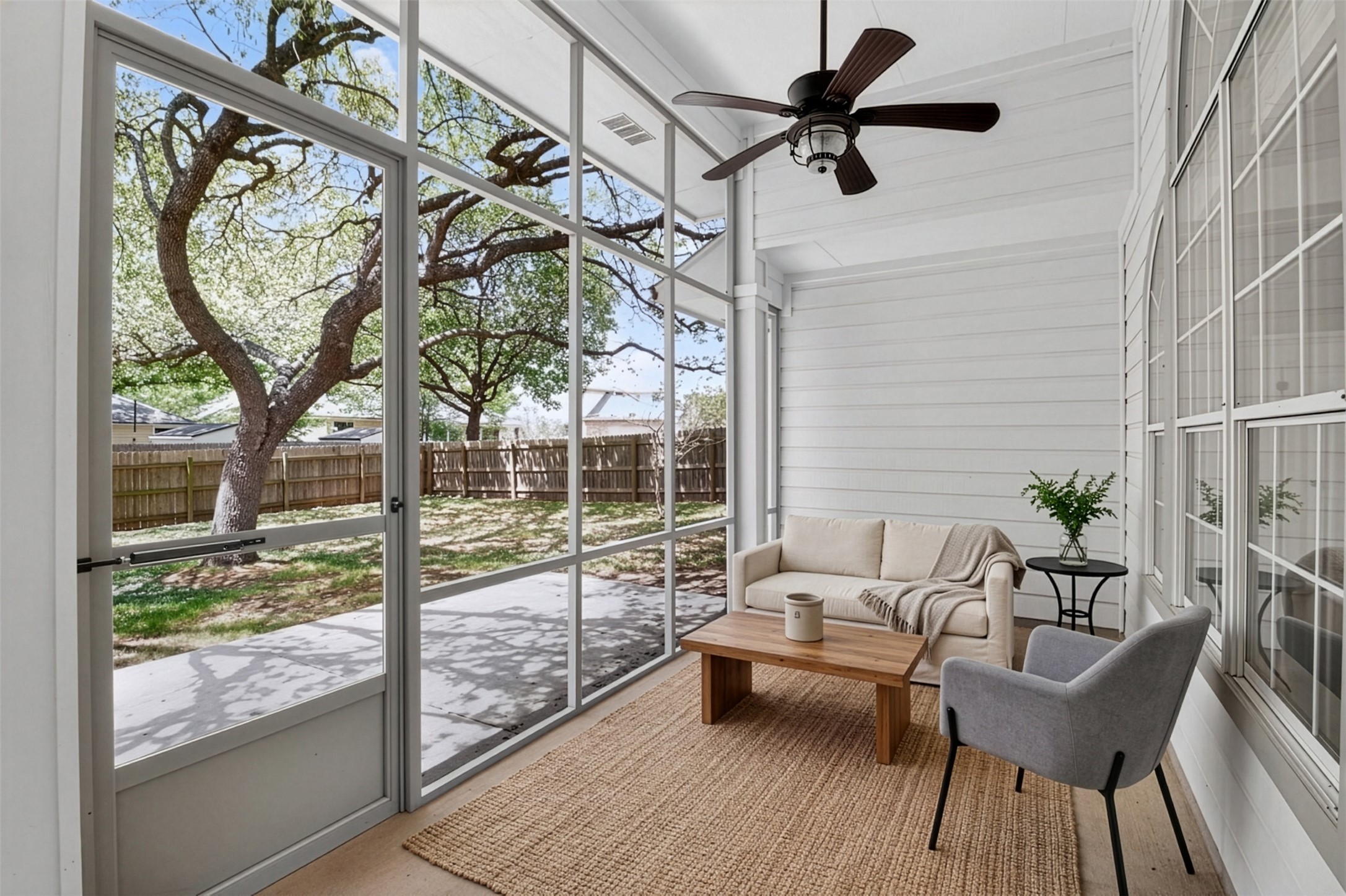 11918 Arbor Downs Road Austin, TX 78748 - Photo 11 of 29 (virtual staging)
Sunroom / solarium featuring ceiling fan, healthy amount of natural light, and outdoor seating