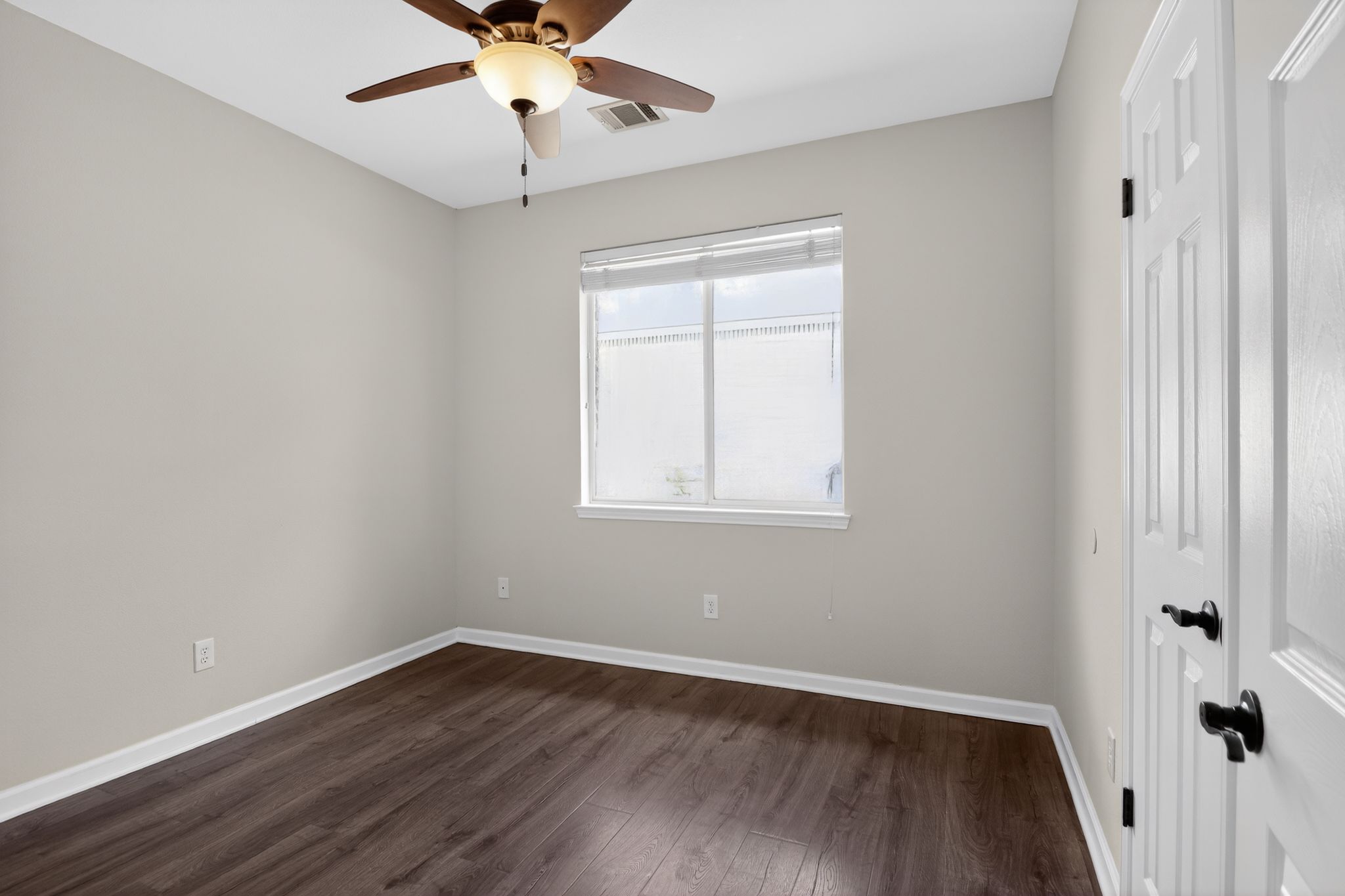 11918 Arbor Downs Road Austin, TX 78748 - Photo 24 of 29 Bedroom featuring dark wood finished floors and a ceiling fan