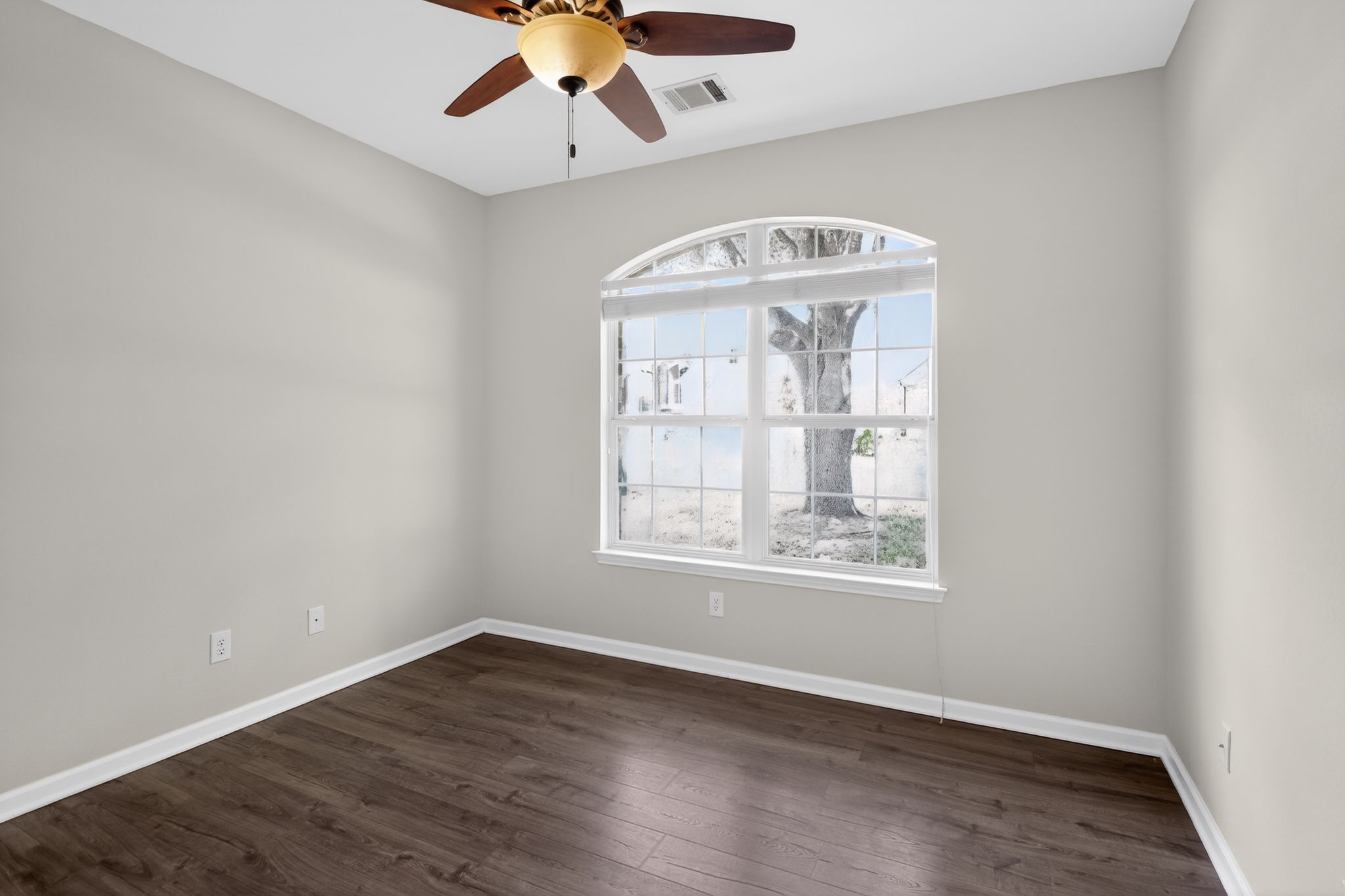 11918 Arbor Downs Road Austin, TX 78748 - Photo 25 of 29 Spare room featuring ceiling fan and dark wood-type flooring