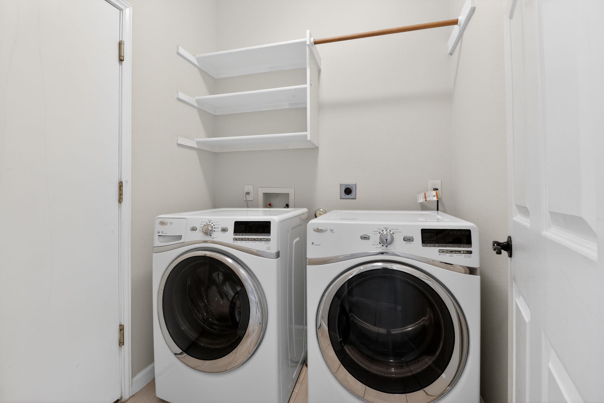 11918 Arbor Downs Road Austin, TX 78748 - Photo 26 of 29 Laundry room with washing machine and clothes dryer